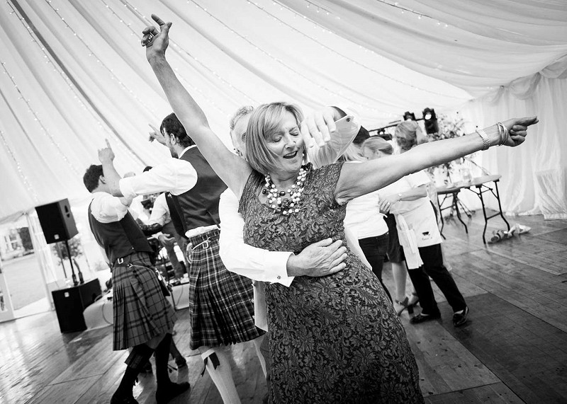 A woman dancing at a wedding